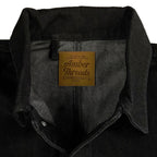 アパレルブランドAmber Threads(アンバースレッズ)のカバーオール ブラックデニム、3シーズン着まわせる万能アウター。本革ロゴ。