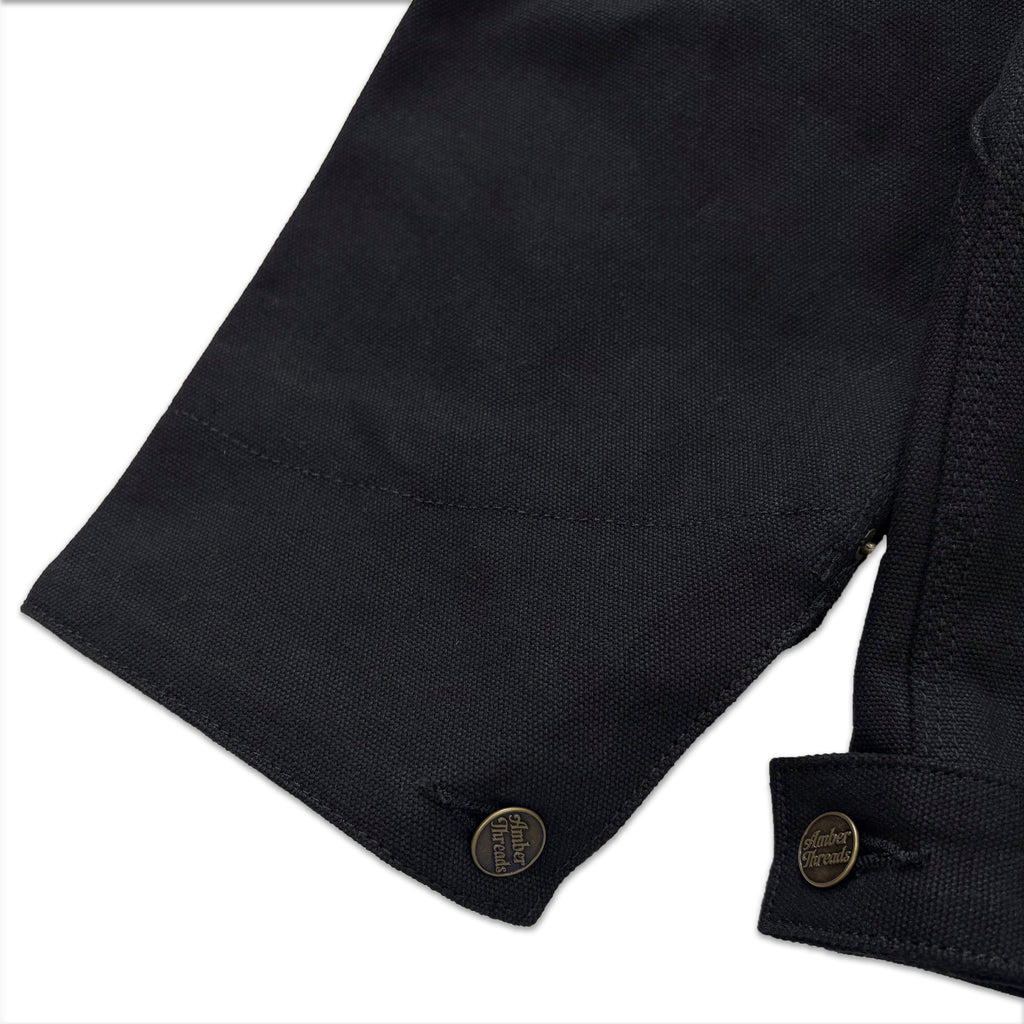 アパレルブランドAmber Threads(アンバースレッズ)のジャケット 襟コーデュロイ コットンキャンバス、3シーズン着まわせる万能アウター。左背面袖口部分。