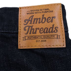 アパレルブランドAmber Threads(アンバースレッズ)のペインターパンツ ブラックデニム、オールシーズン着まわせる万能ズボン。本革ロゴ。